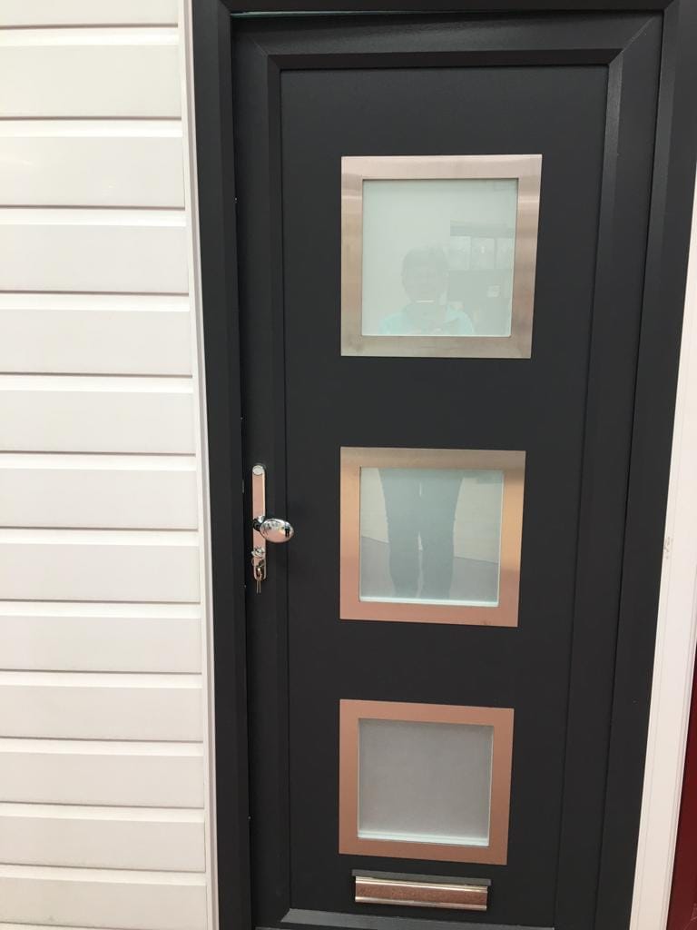 Black composite door with glass panels in Witham, Essex by A&E Window Doctor