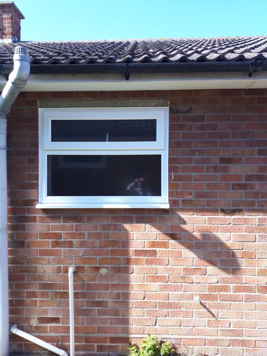 White back door and window in Wivenhoe, Essex by A&E Window Doctor