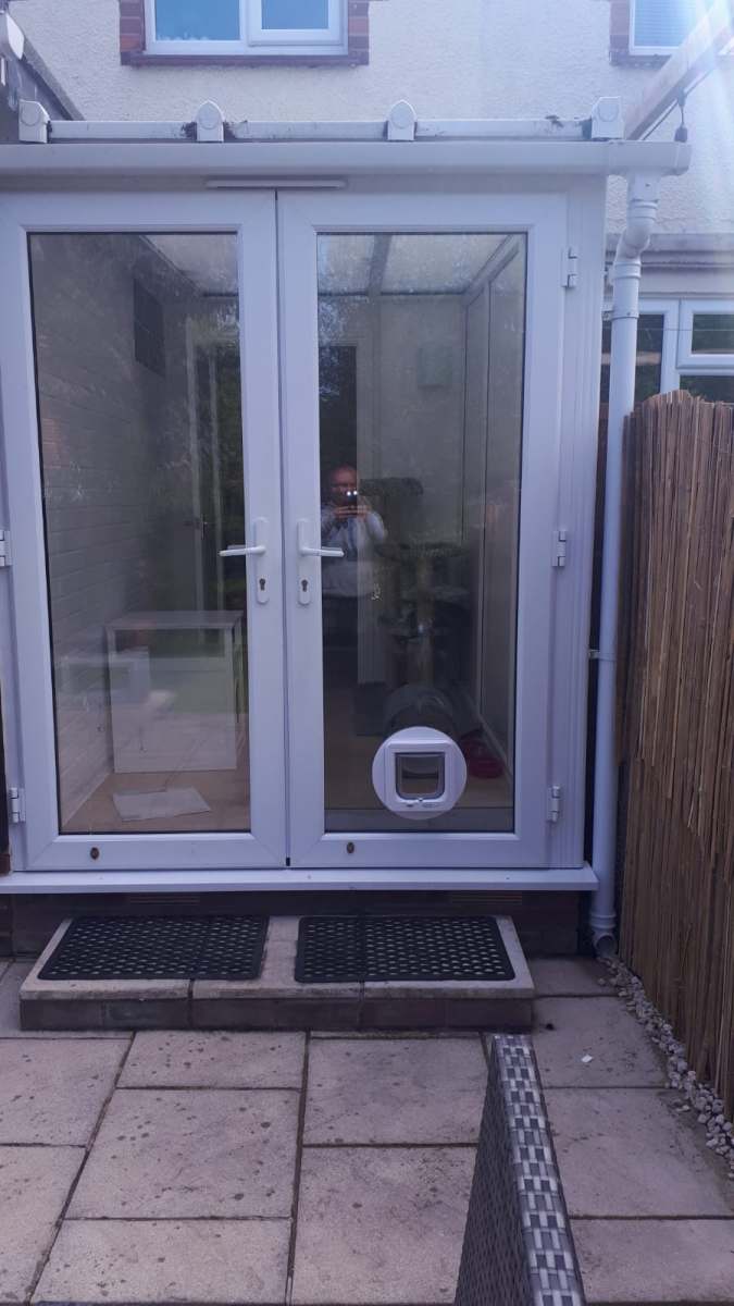 White uPVC front door with glass panels in Mistley, Essex by A&E Window Doctor